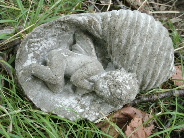 cement fairy statues