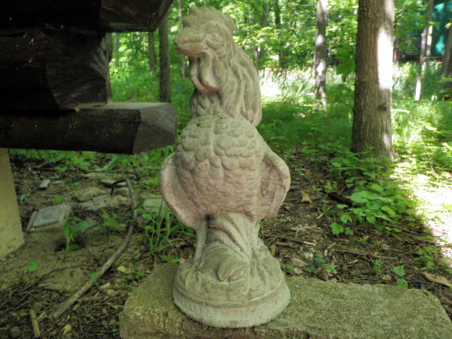 cement rooster statue