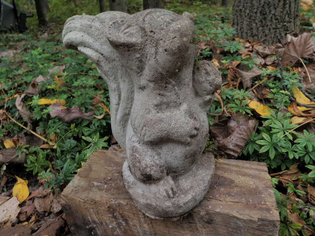 cement squirrel statue